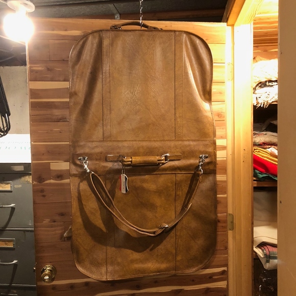 american tourister suit bag